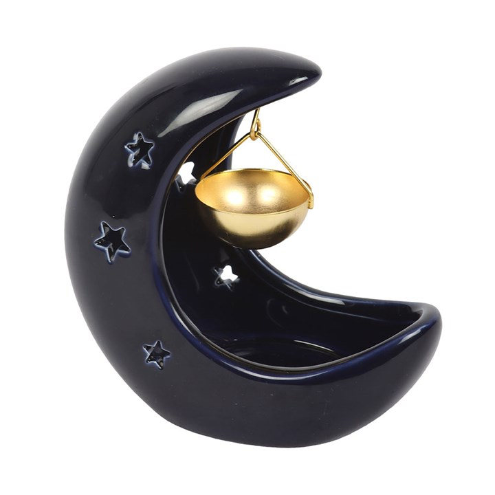 Blue ceramic crescent moon oil burner close up