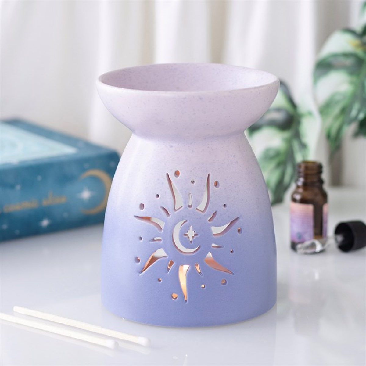 Purple sun cut out ceramic oil burner